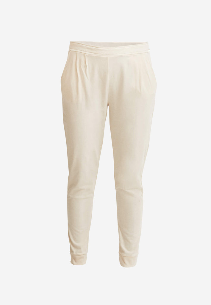 Lange Pyjamahose (Tapered Fit) in der Farbe „moon white“ für Damen mit seitlichen Eingrifftaschen und weichen, leicht elastischen Beinbündchen.